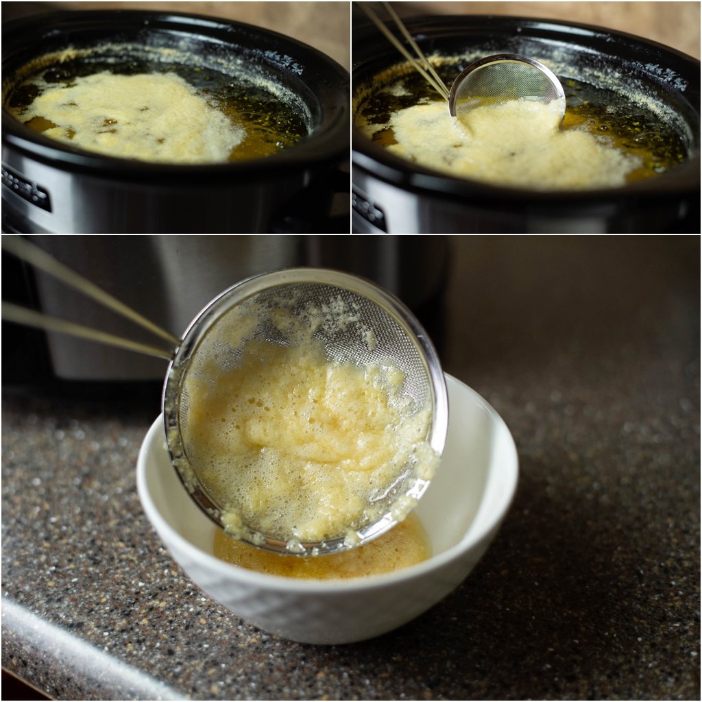 Ghee bez laktozy obok mleka krowiego butelka ghee stoi obok szklanki mleka na kuchennym blacie